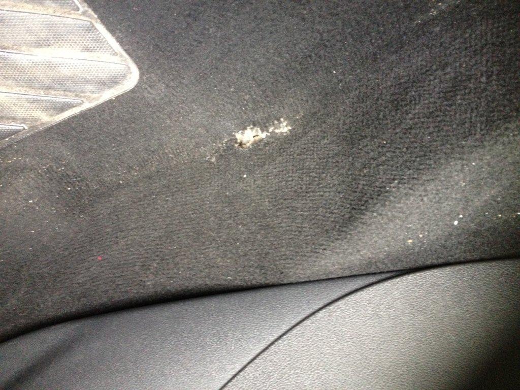 Vauxhall carpet hole