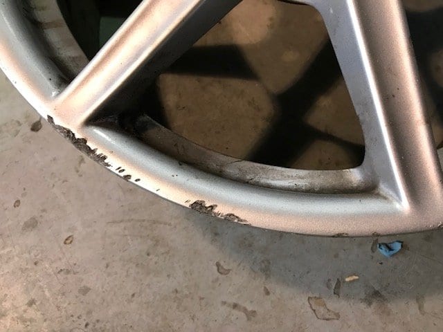 Aston Martin damaged alloy
