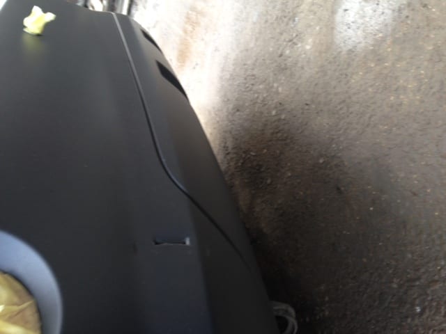 Damaged Vauxhall plastic bumper