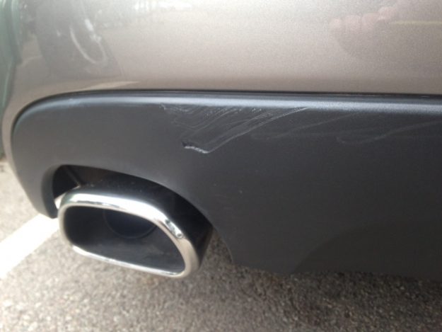 Damaged Jaguar plastic panel