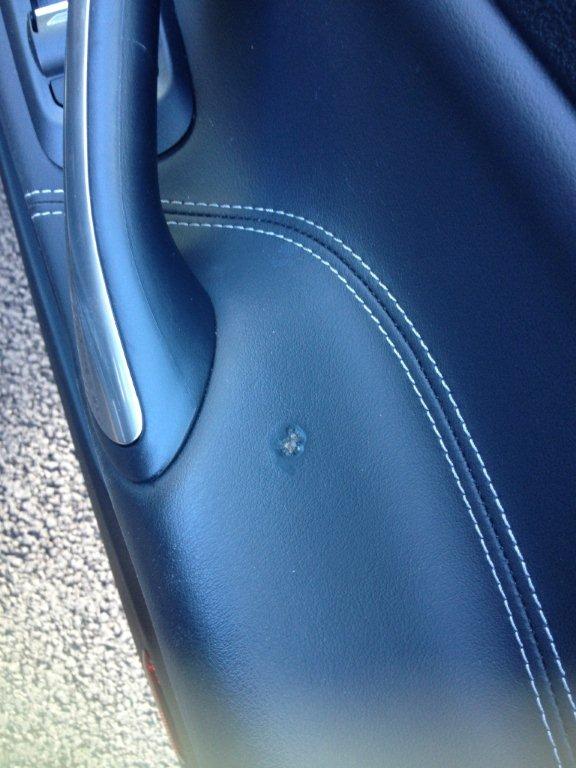 Burn, Leather Door Panel on a Ford Mondeo